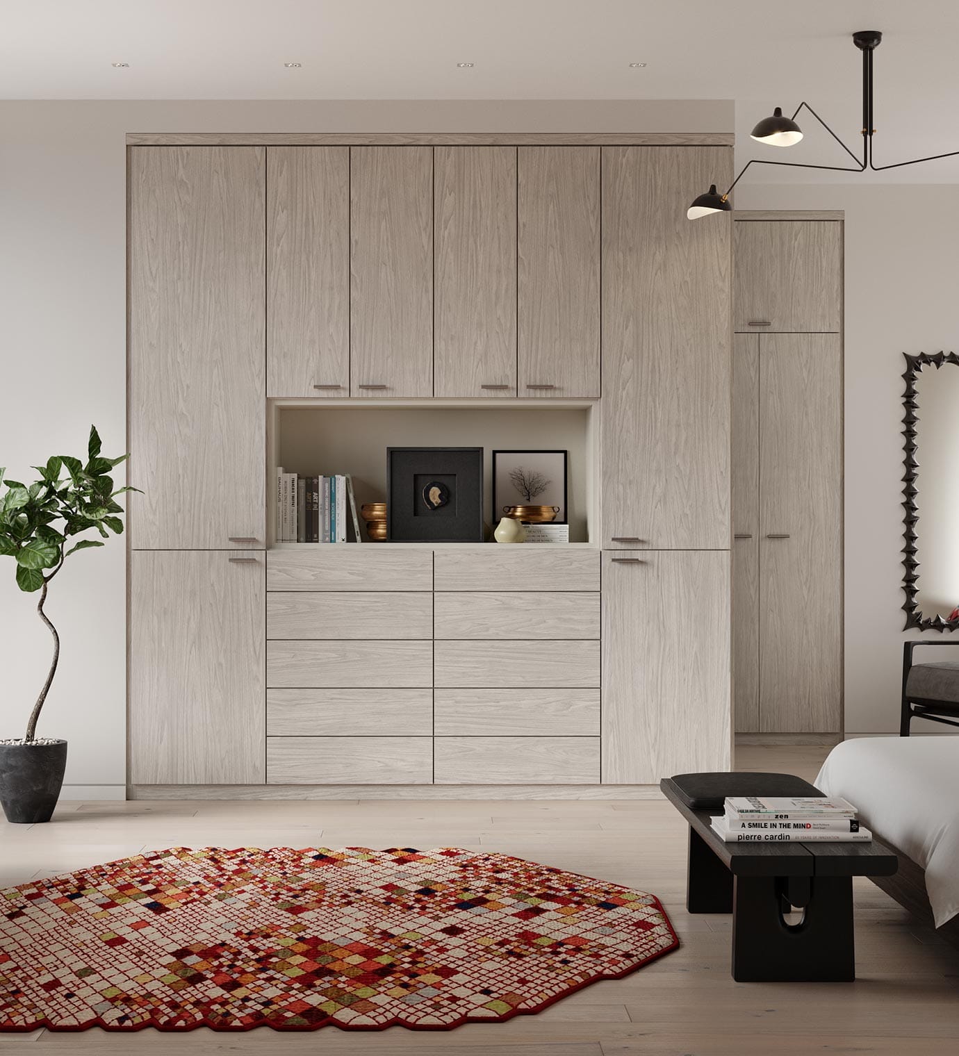 Wardrobe closet installed with custom-built cabinets, counterspace and drawers by California Closets