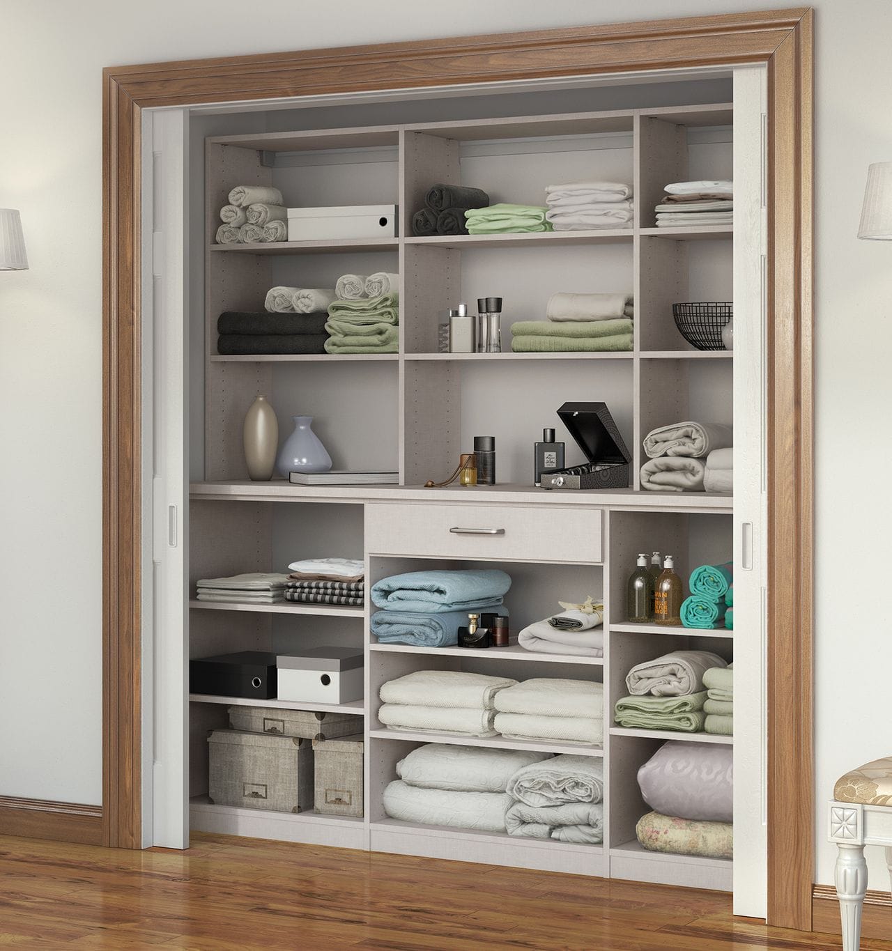 Hall linen closet shelves with custom wood grain finish by California Closets