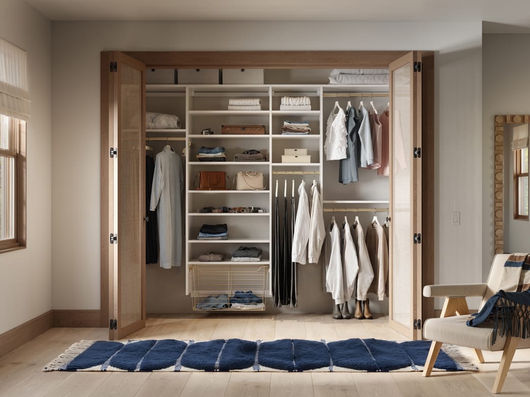 Basic reach in open shelving and storage baskets by California Closets